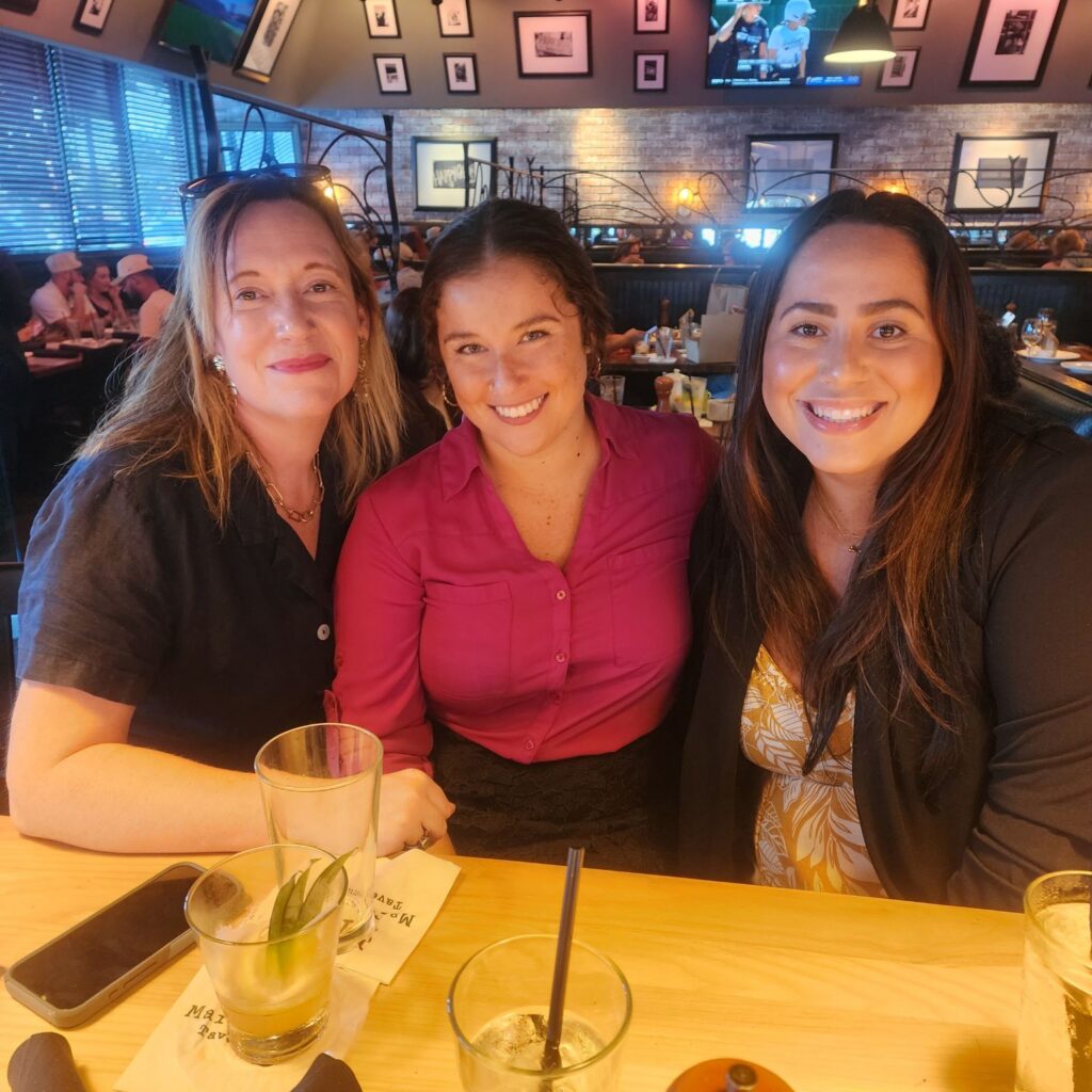 WID Central Florida members smile at the No-Host Social